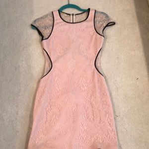 Pink lace dress with black trim